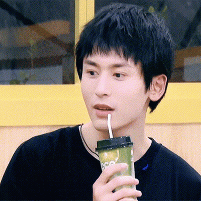 Young Man Drinking Through Straw GIF