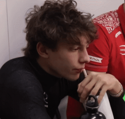 Young Man Drinking Water With Enol Shirt GIF