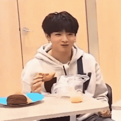 Young Man Eating Sandwich GIF