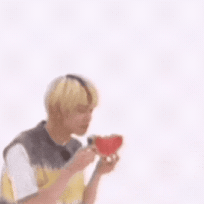 Young Man Eating Watermelon With Question Mark GIF