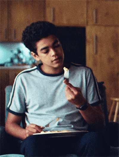 Young Man Eating With Fork GIF