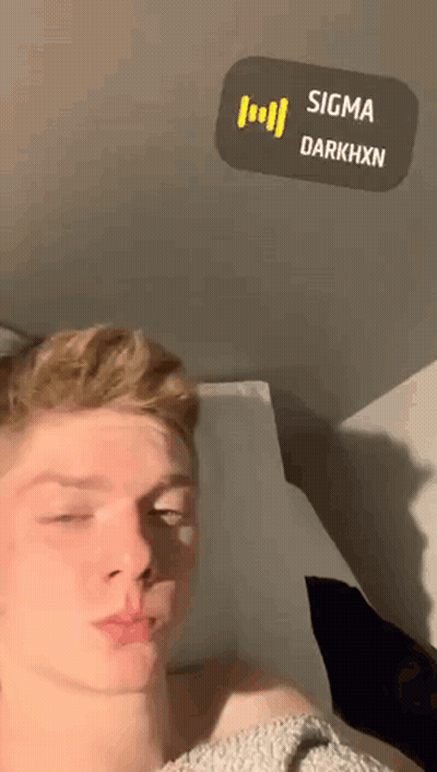 Young Man Eyes Closed With Sigma Darkhxn Sticker Above GIF