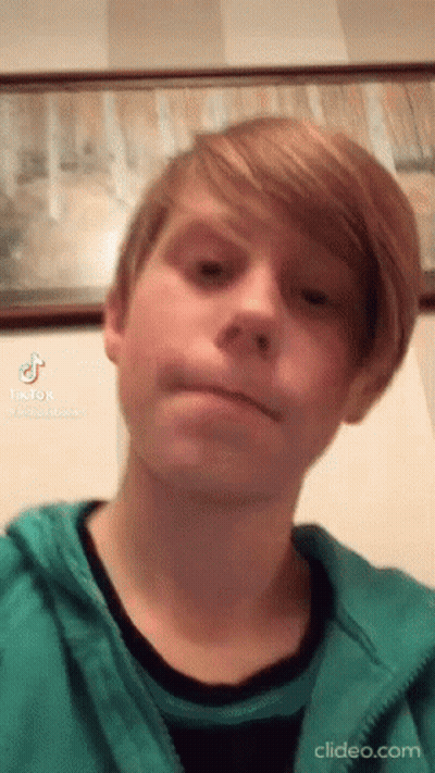 Young Man Green Jacket Black Shirt Funny Face GIF