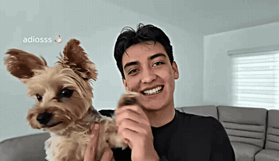 Young Man Holding Brown Dog Smiling Adiosss GIF