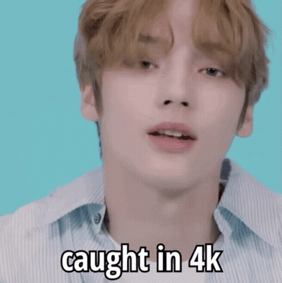 Young Man Holding Camera Saying Caught In 4K GIF