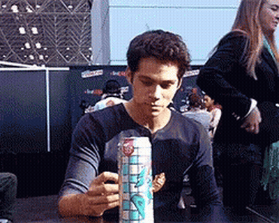 Young Man Holding Can Of Soda GIF