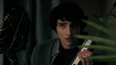Young Man Holding Cell Phone GIF