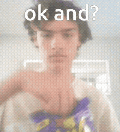Young Man Holding Chips Saying Ok And GIF