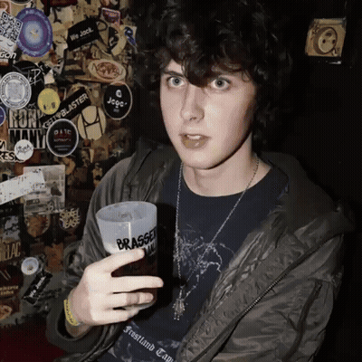 Young Man Holding Cup That Says Brasse GIF