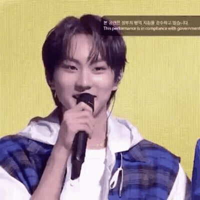 Young Man Holding Microphone GIF