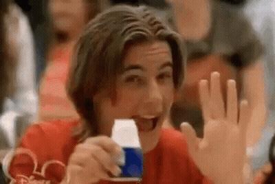 Young Man Holding Pepsi Can And Waving GIF