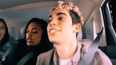 Young Man In Back Seat With Two Women GIF