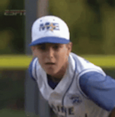 Young Man In Baseball Cap And Jersey On Field GIF