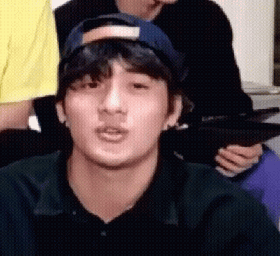 Young Man In Baseball Cap Making Funny Face GIF