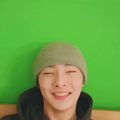 Young Man In Beanie And Black Hoodie Funny Face GIF