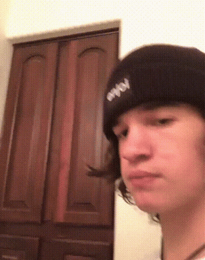 Young Man In Beanie Making Funny Face GIF