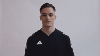 Young Man In Black Adidas Shirt Making Funny Face GIF