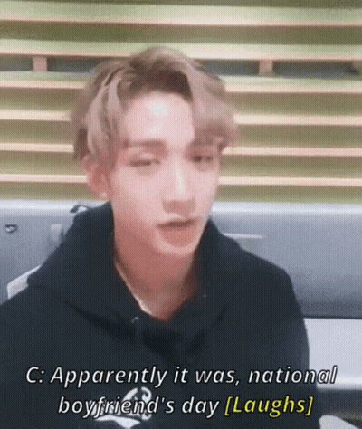 Young Man In Black Hoodie Laughing About National Boyfriend's Day GIF