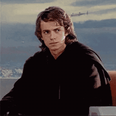 Young Man In Black Hoodie Sitting By Window GIF