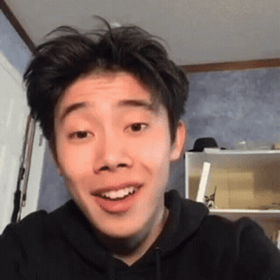 Young Man In Black Hoodie Smiling GIF