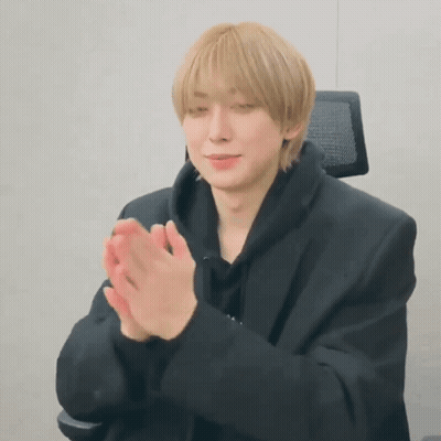 Young Man In Black Jacket Clapping Hands GIF