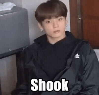 Young Man In Black Jacket Making Funny Face GIF