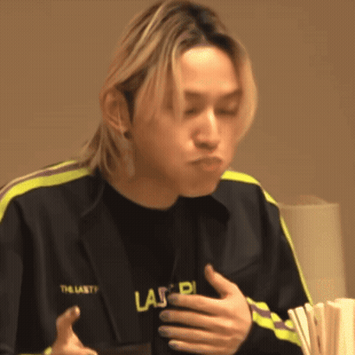 Young Man In Black Jacket Saying Las GIF