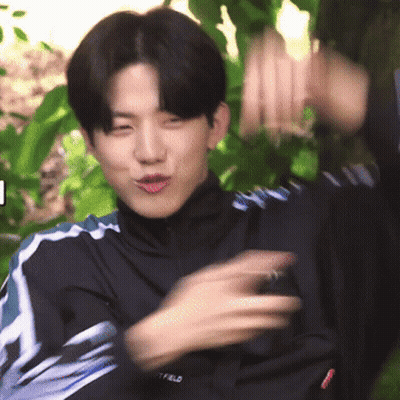 Young Man In Black Jacket With Field GIF