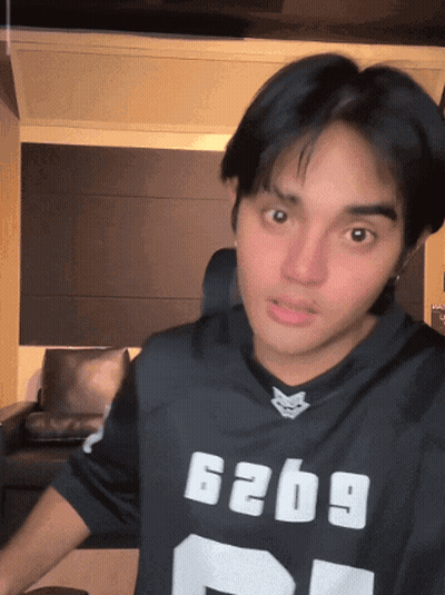 Young Man In Black Jersey 6269 GIF