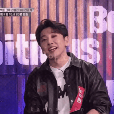 Young Man In Black Leather Jacket Smiling At Be Sign GIF