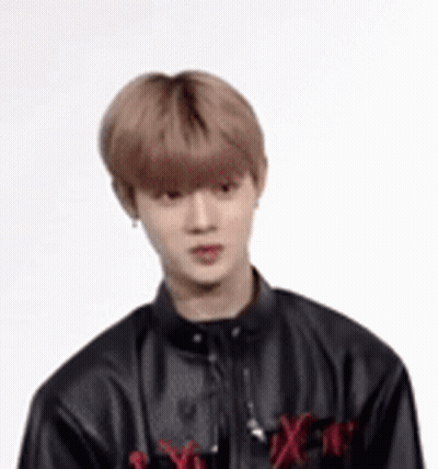 Young Man In Black Leather Jacket With Earphones GIF