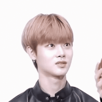 Young Man In Black Leather Jacket With Earrings GIF