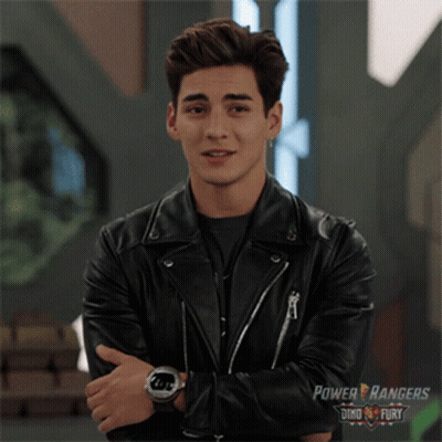 Young Man In Black Leather Jacket With Power Rangers Logo GIF
