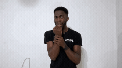 Young Man In Black Royal T-Shirt Making Funny Face GIF