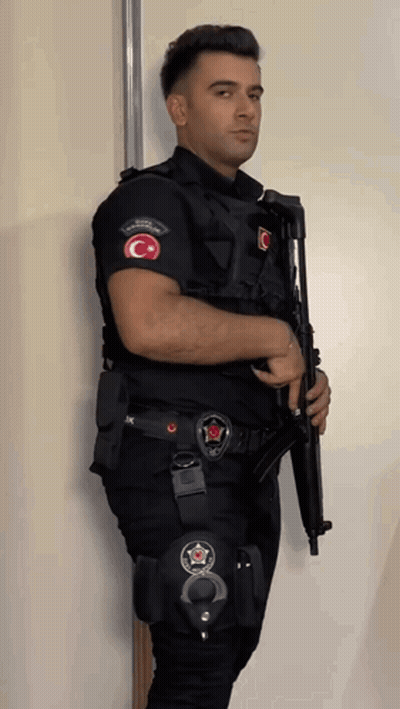 Young Man In Black Security Tank Top GIF