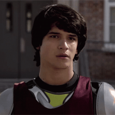 Young Man In Black Shirt And Red Vest GIF