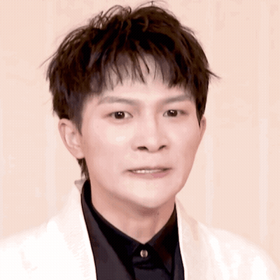 Young Man In Black Shirt And White Jacket GIF