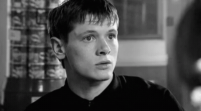 Young Man In Black Shirt Black And White Photo GIF