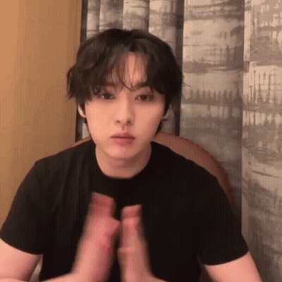 Young Man In Black Shirt Clapping Hands GIF
