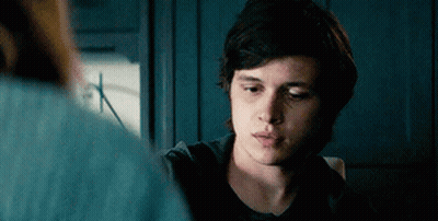 Young Man In Black Shirt Looking At Woman GIF
