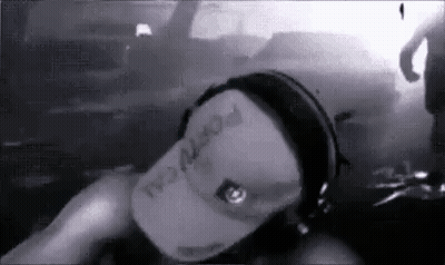 Young Man In Black Shirt Making Funny Face GIF