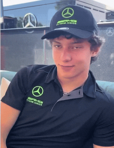 Young Man In Black Shirt Saying AMG GIF