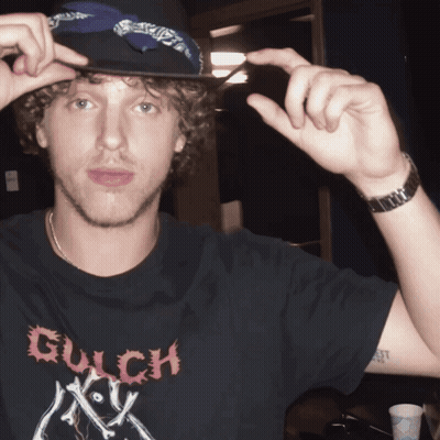 Young Man In Black Shirt Saying Gulch GIF