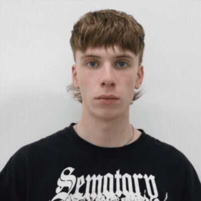 Young Man In Black Shirt Saying Sematary GIF