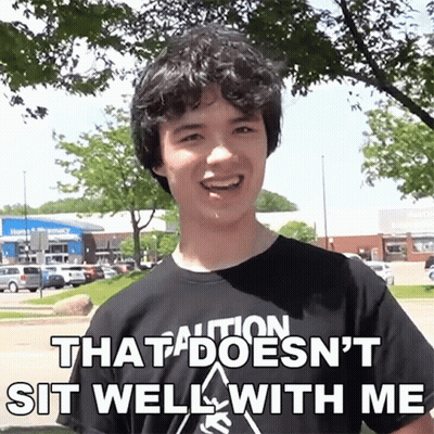 Young Man In Black Shirt That Doesn't Sit Well With Me GIF