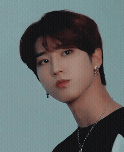 Young Man In Black Shirt With Necklace GIF