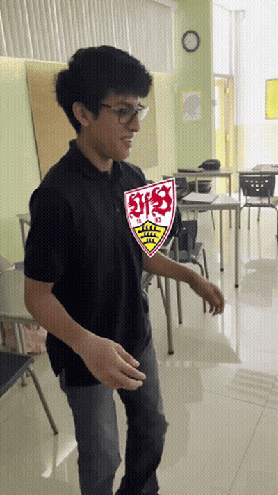 Young Man In Black Shirt With SVS Shield GIF