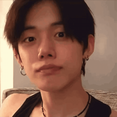 Young Man In Black Tank Top And Earrings GIF