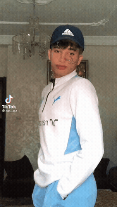 Young Man In Blue Adidas Hat And White Sweater GIF