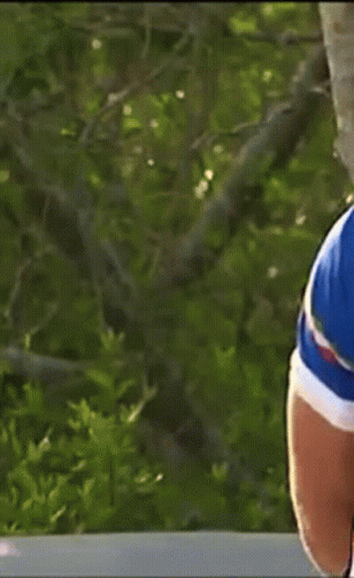 Young Man In Blue Adidas Sweater Standing In Doorway GIF